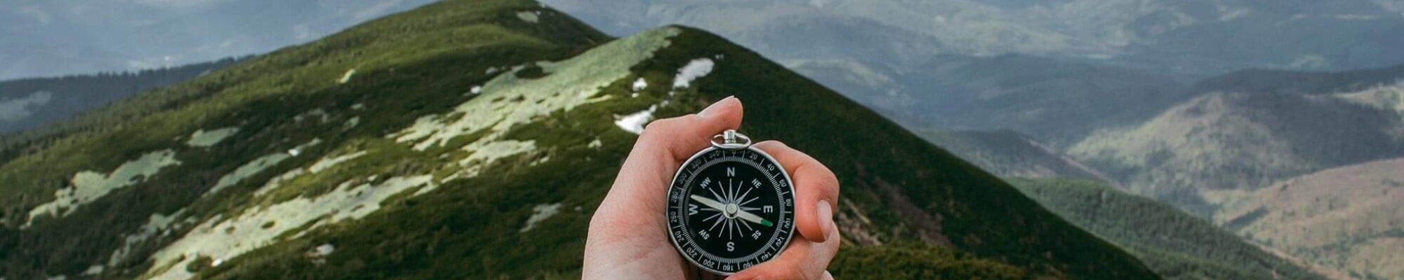 Compass in an outstretched hand